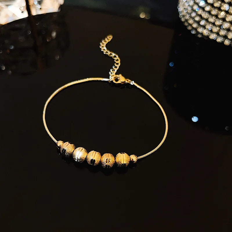 Pulseira Yohi TT de pérolas e camélias ~ de zircônia