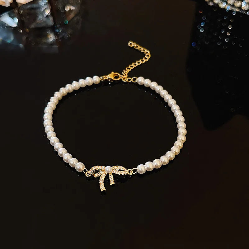 Pulseira Yohi TT de pérolas e camélias ~ de zircônia